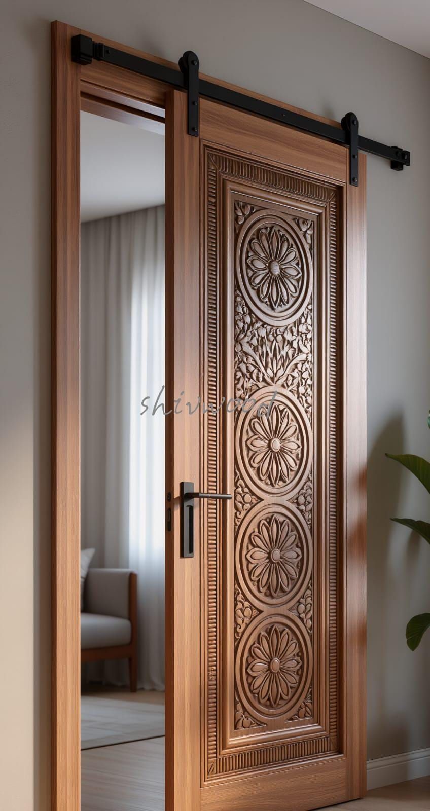 Ornately Carved Wooden Sliding Barn Door in Modern Living Space