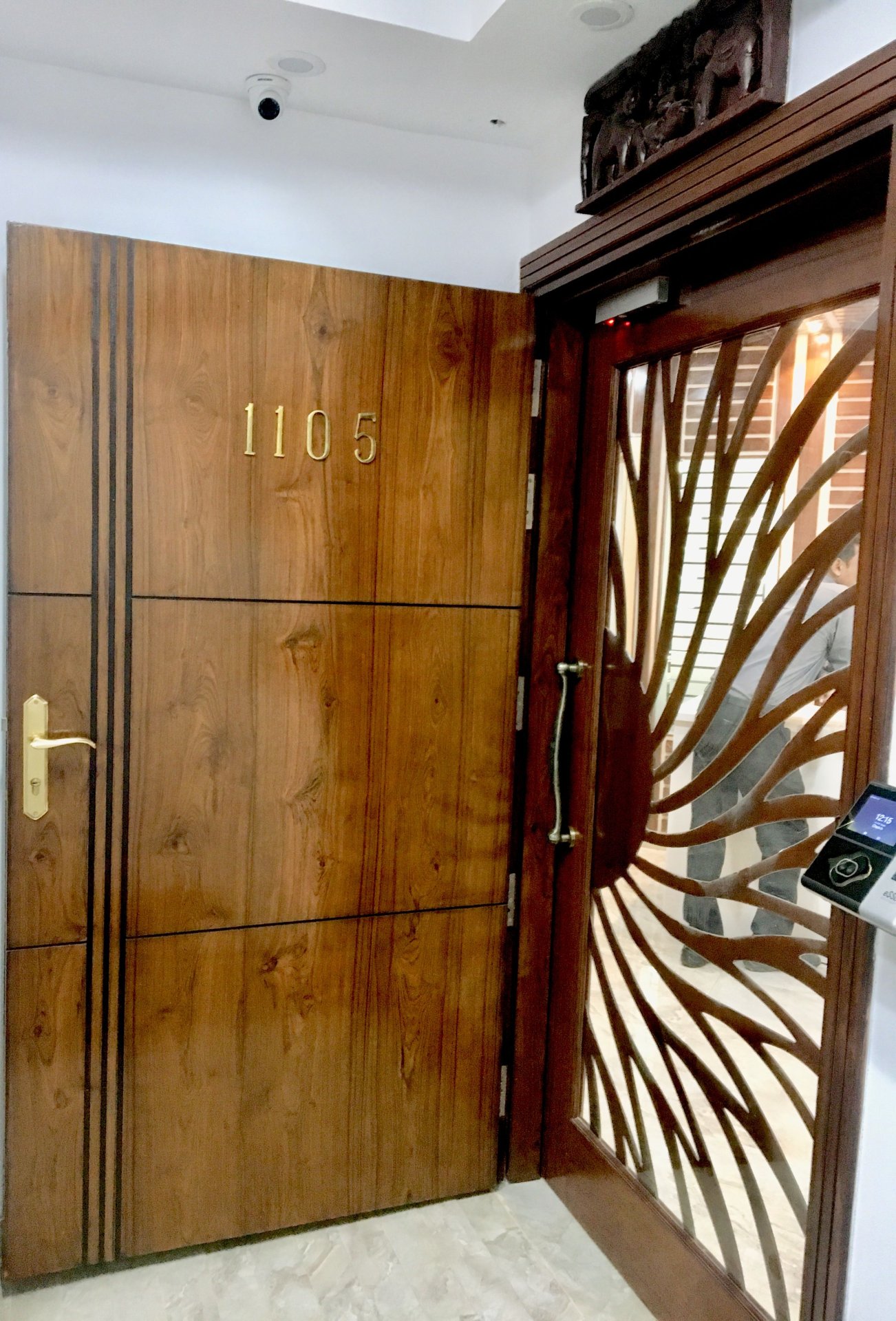 Contemporary Apartment Entrance with Wooden Double Doors