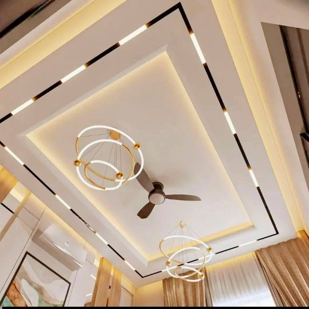 Modern Living Room Ceiling with Geometric Lighting and Fan