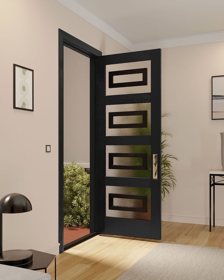 Modern Black Entry Door with Frosted Glass Insets in a Neutral Foyer